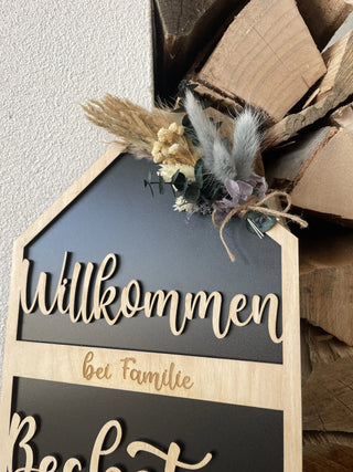 Schlüsselhaus mit Familienname